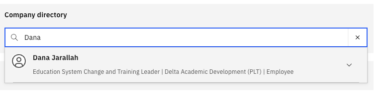 The Company Directory search screen with a name entered in the search bar and matching employee results displayed below